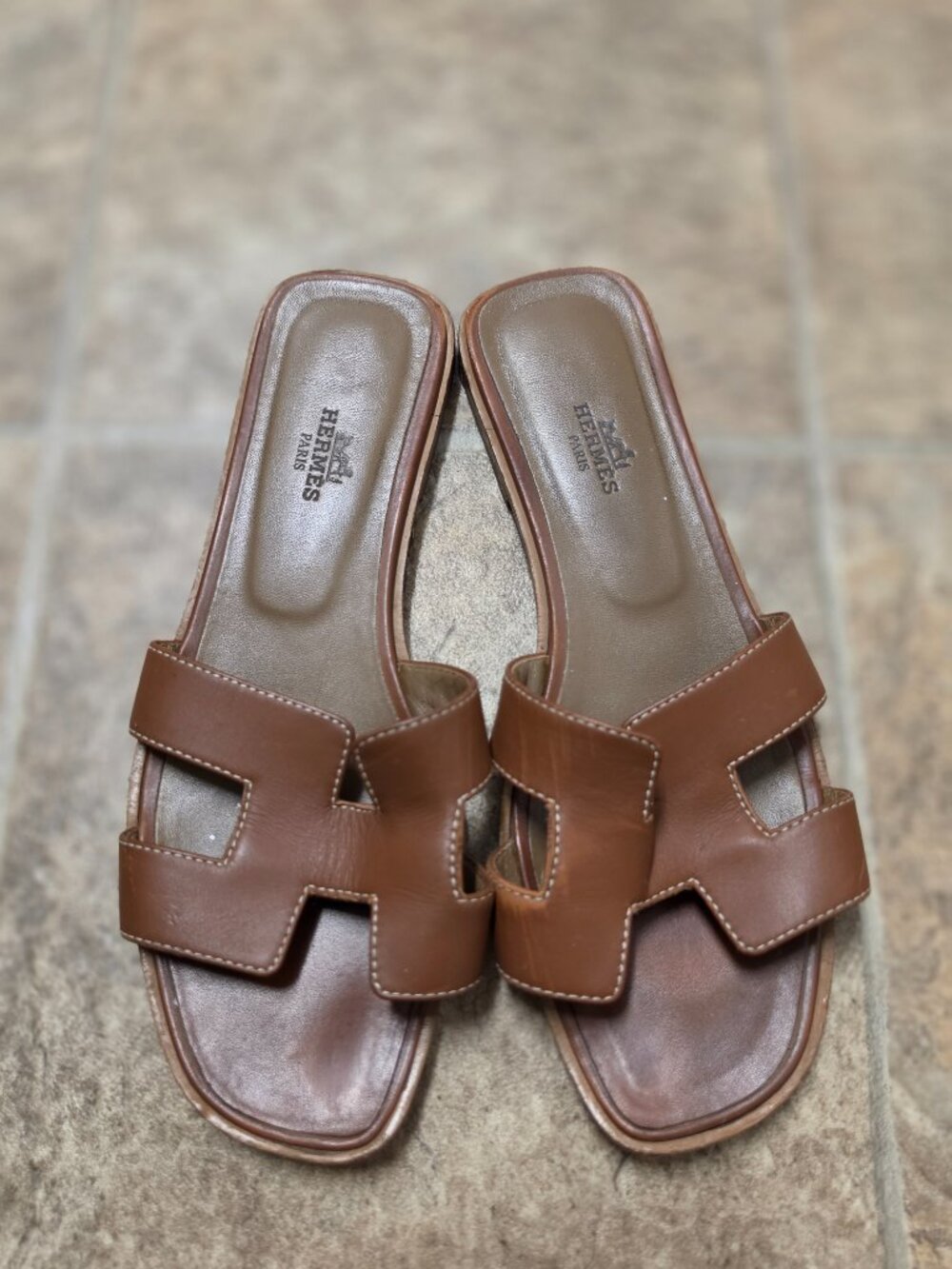 Women's Classic Hermes Oran Sandals, rich gold-brown leather, "H" cut-out strap